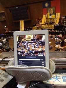 An iPad was filming the occupation and broadcasting it online via video streaming technology. Photo courtesy Slipper Family.